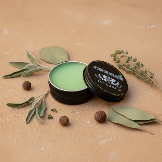 smoothie bowlTattoo balm in a black tin with leaves and berries on a beige background