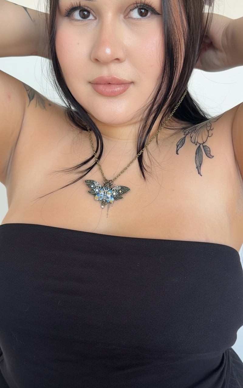 The Collective Moth Amulet